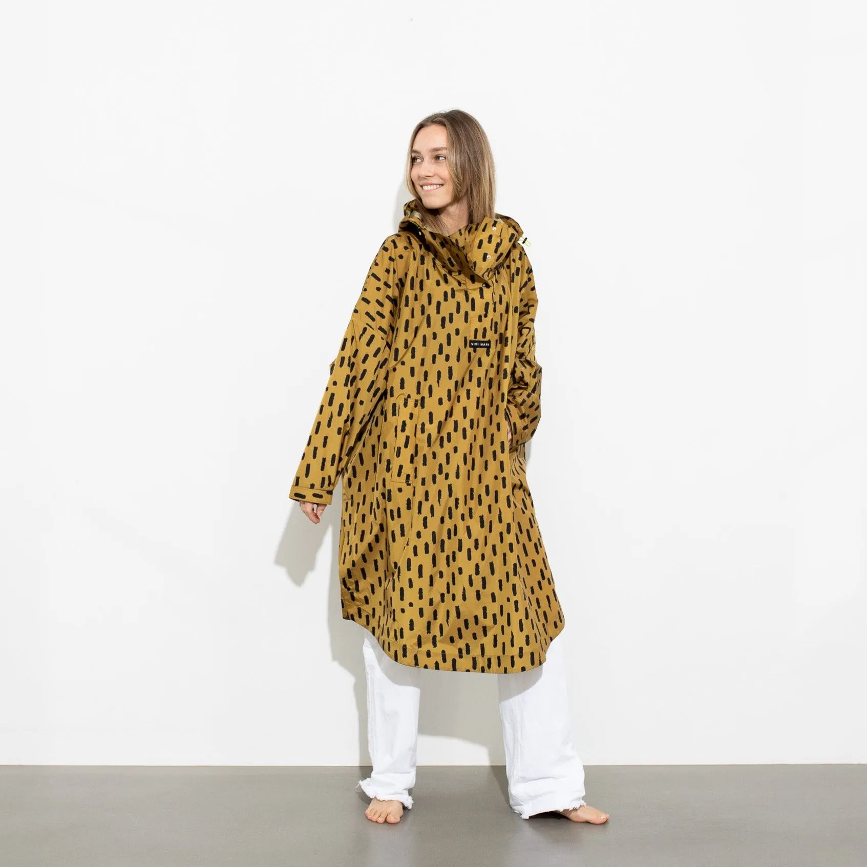 Raincoat drops mustard/black